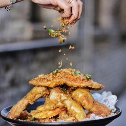 Z & Y Peking Duck signature dishes Peking Duck, Spicy Crispy Chicken Wings, Fish in Sizzling Chili Oil, Hand-Pulled Noodles